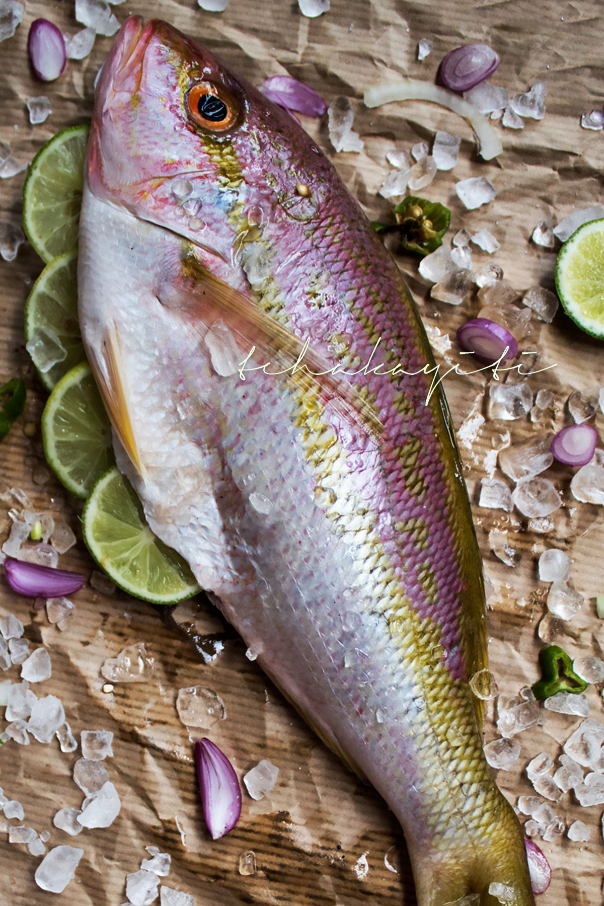 Poisson Gros Sel, a red snapper cooked in a court-bouillon with coarse salt, is a typical Haitian dish that is quite easy to make. Grab the recipe now. | tchakayiti.com