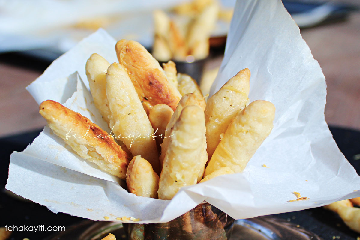 These Haitian cheese sticks require 3 ingredients: butter, cheese, flour. A great baking lesson for young kids. | tchakayiti.com