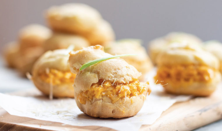 These pâte à choux, or bouchées as we call them, as filled with a spicy cheese spread enhanced with strong aromas of green pepper. They're a must on your appetizer menu. | tchakayiti.com