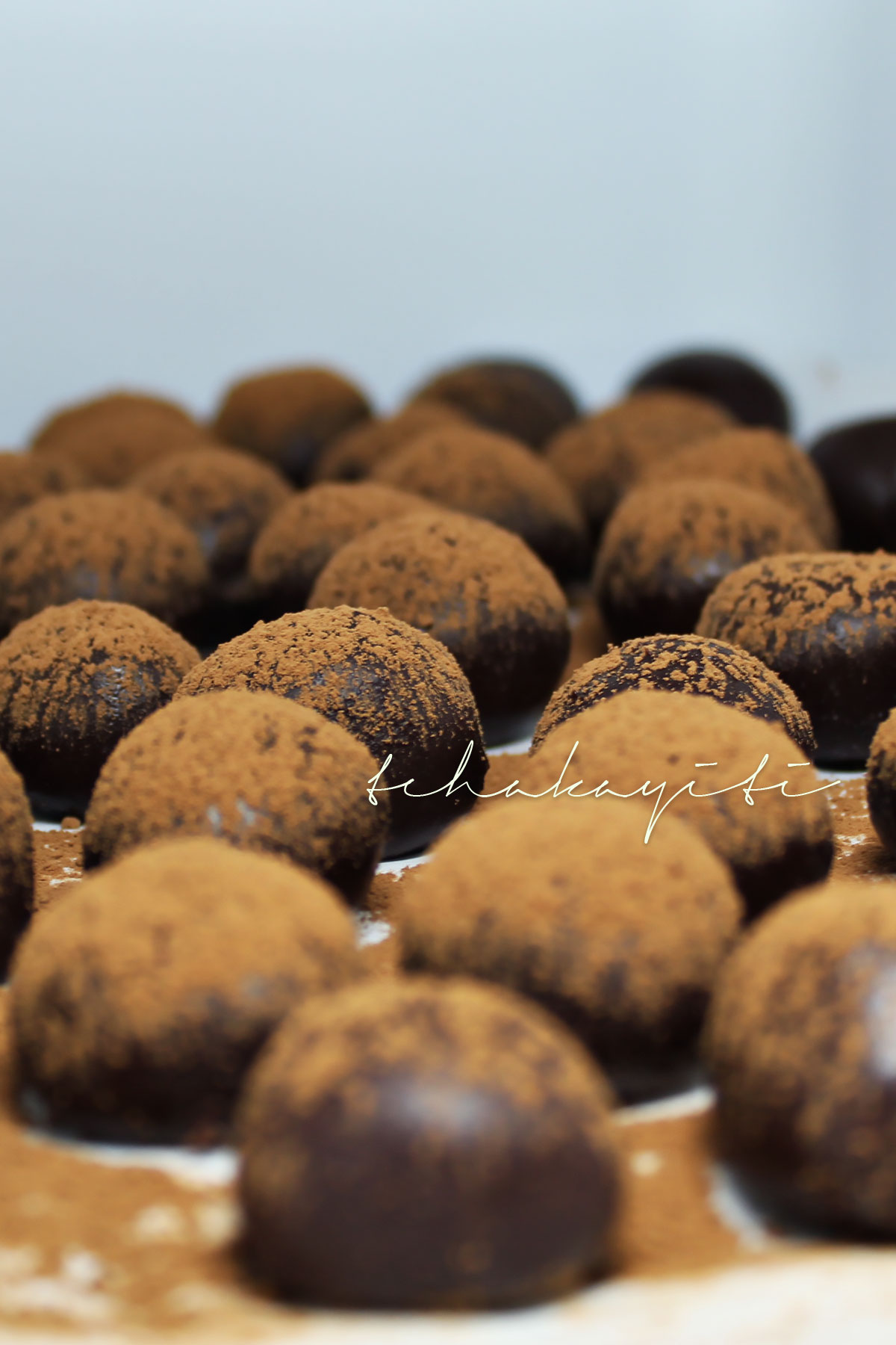 These boozy Haitian rum infused dark Haitian chocolate truffles will certainly leave you begging for more. | tchakayiti.com