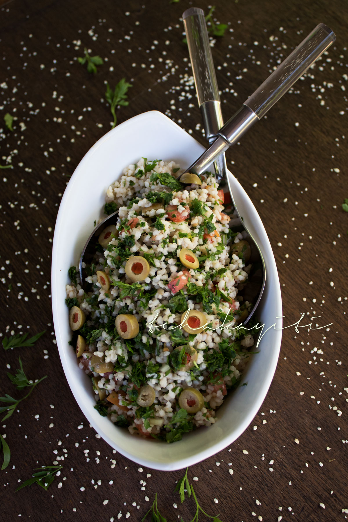 Pitimi makes a deliciously light and fluffy tabbouleh style millet salad. I encourage you to try this easy recipe. | tchakayiti.com 