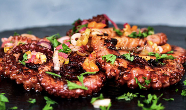 These spicy grilled octopus are served with a hot lime sauce. | tchakayiti.com