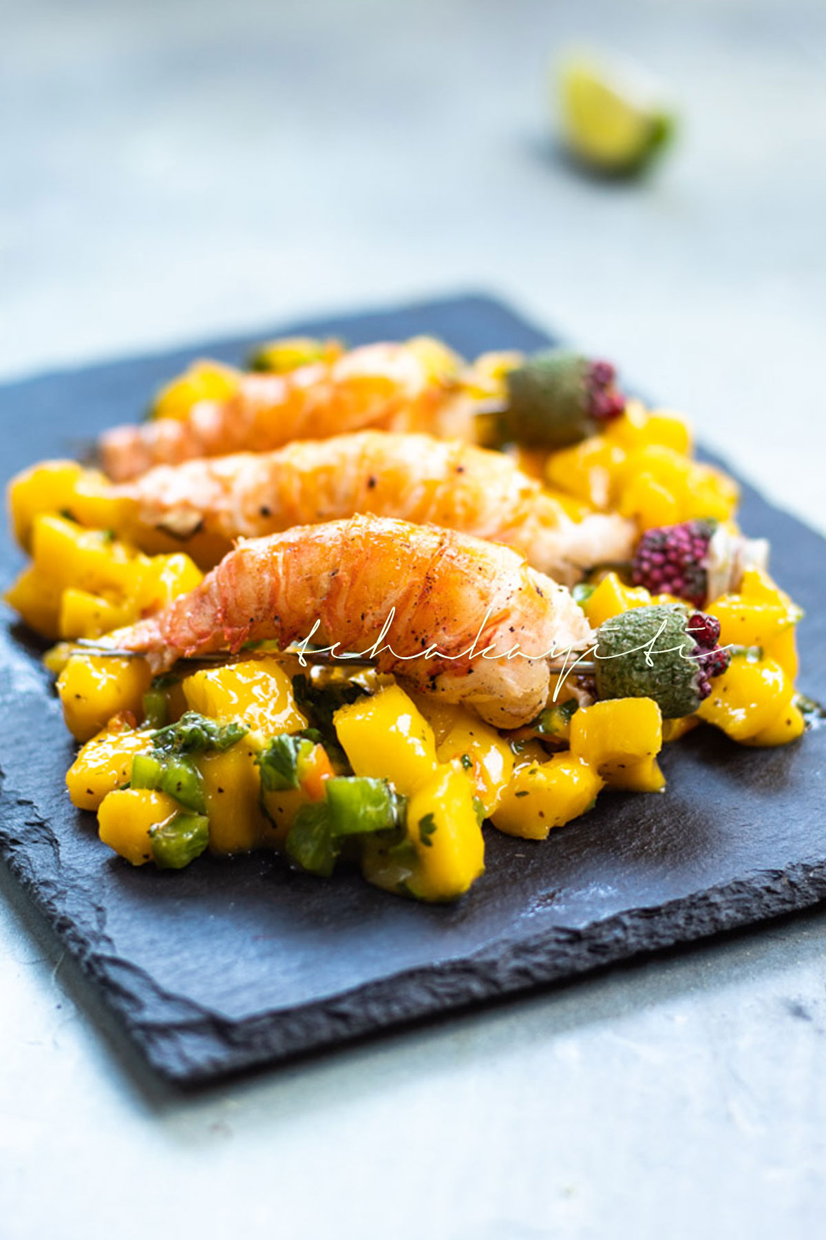 This ginger mango lobster salad is vibrant, spicy and hot just like summer. The best and easiest summer salad you'll ever prepare. | tchakayiti.com