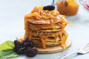 These pancakes are topped with a delightfully spicy mango chutney. A must try. | tchakayiti.com