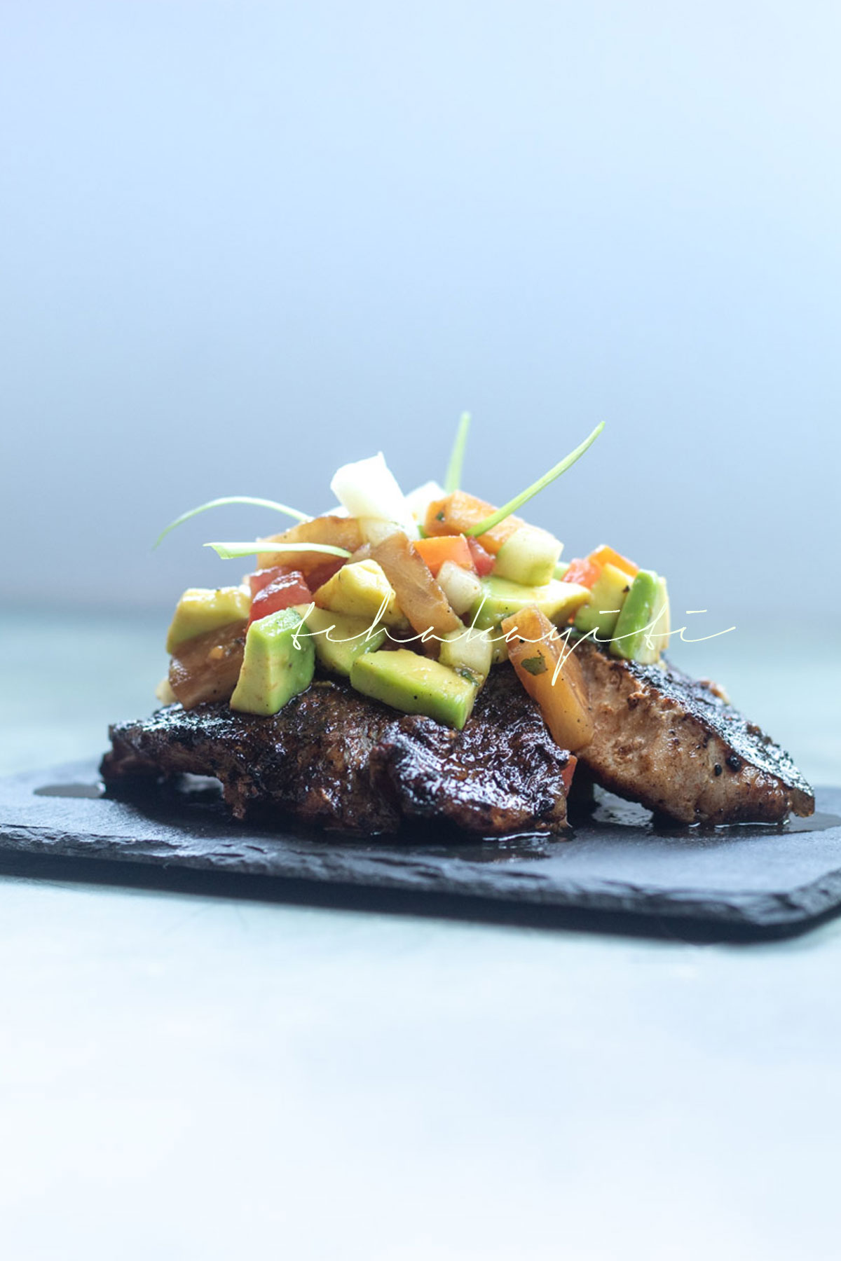 This grilled pineapple avocado salad is packed with wonderful flavors that will awaken your senses. | tchakayiti.com