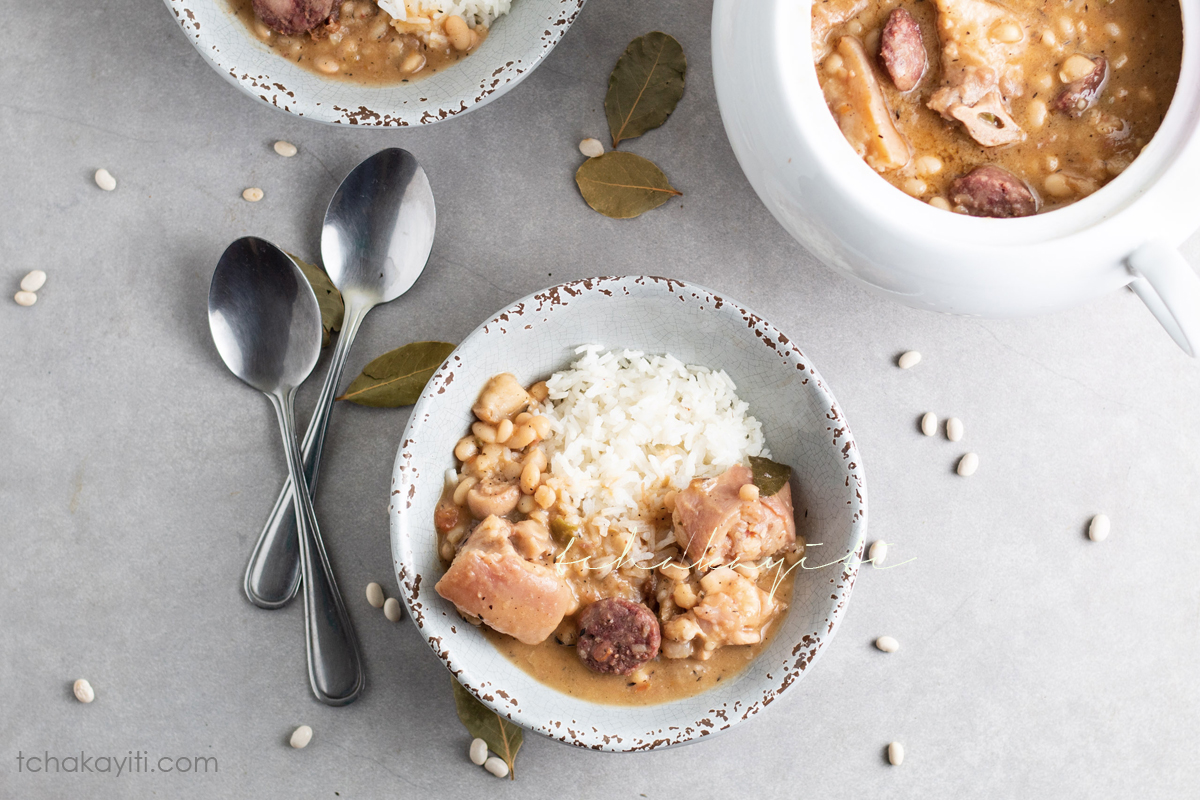 This Haitian-style cassoulet is packed with flavors of homemade salt-cured pork and smoked meat chunks. | tchakayiti.com