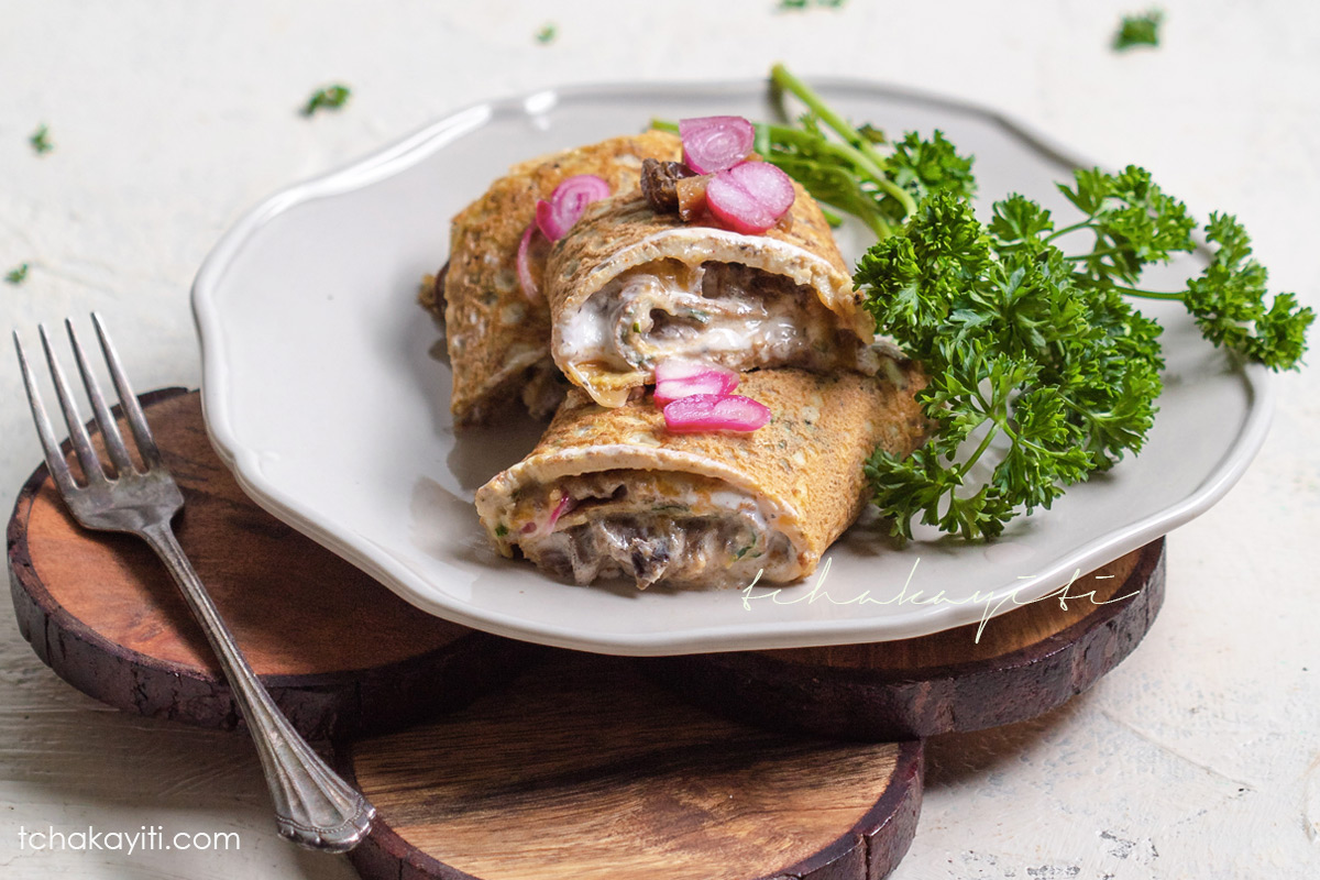 Omelette roll stuffed with aransò, salted smoked herring, sharp cheddar, sour cream and pickled shallots. | tchakayiti.com