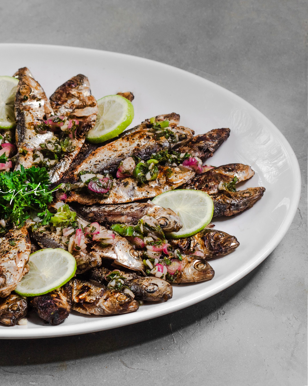 Grilled sardines with zesty hot lime habanero sauce